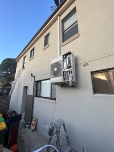 Daikin ducted outdoor unit on wall brackets at Neutral bay