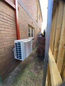 Outdoor multi Daikin unit installed on a sideway