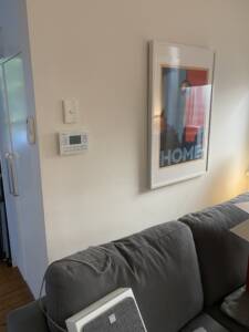 Wall control for a ducted system installed in a living