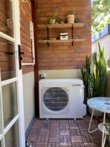 Outdoor AC unit installed on balcony at Mosman area