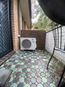 Daikin outdoor ac unit on a balcony at Cremorne