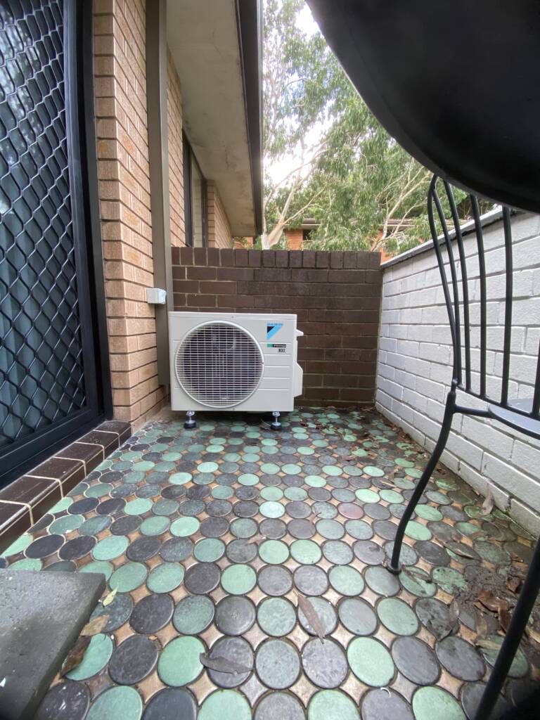 Daikin outdoor ac unit on a balcony at Cremorne