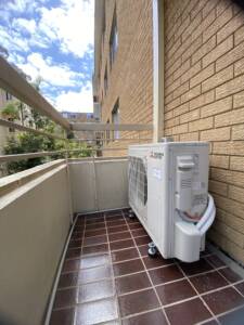 Outdoor ac unit installed on a balcony at Cremorne