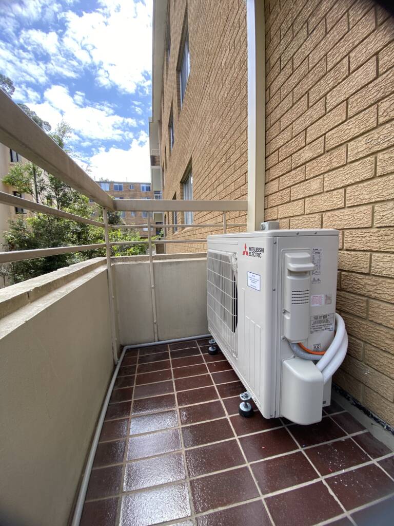Outdoor ac unit installed on a balcony at Cremorne
