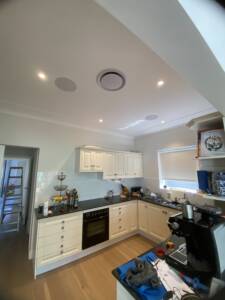Round ceiling vent installed in a living room